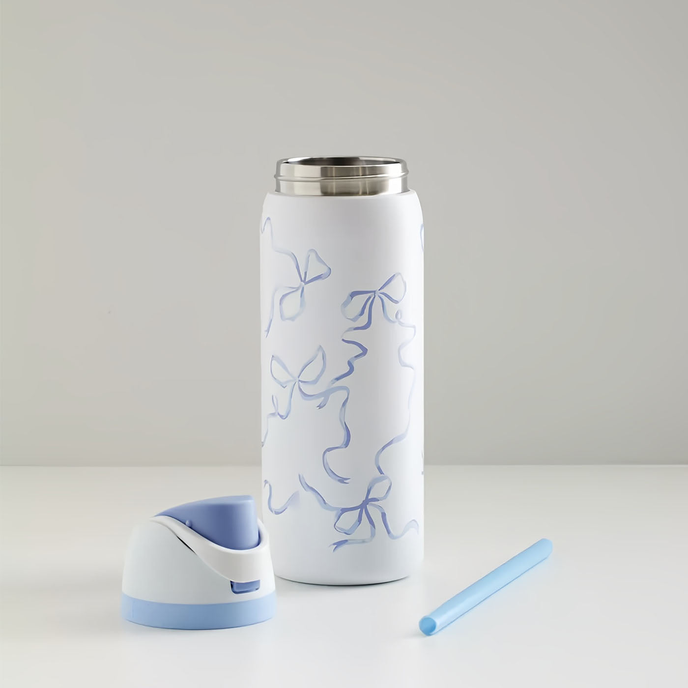 32oz Exclusive Bow FreeSip Insulated Stainless Steel Water Bottle for Sports and Travel, BPA-Free