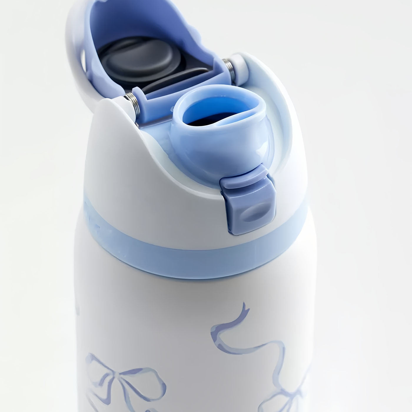 32oz Exclusive Bow FreeSip Insulated Stainless Steel Water Bottle for Sports and Travel, BPA-Free